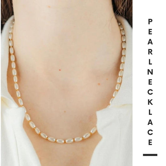 Understated Opulence: Embrace Everyday Elegance with our Small White Oval Freshwater Pearl Necklace