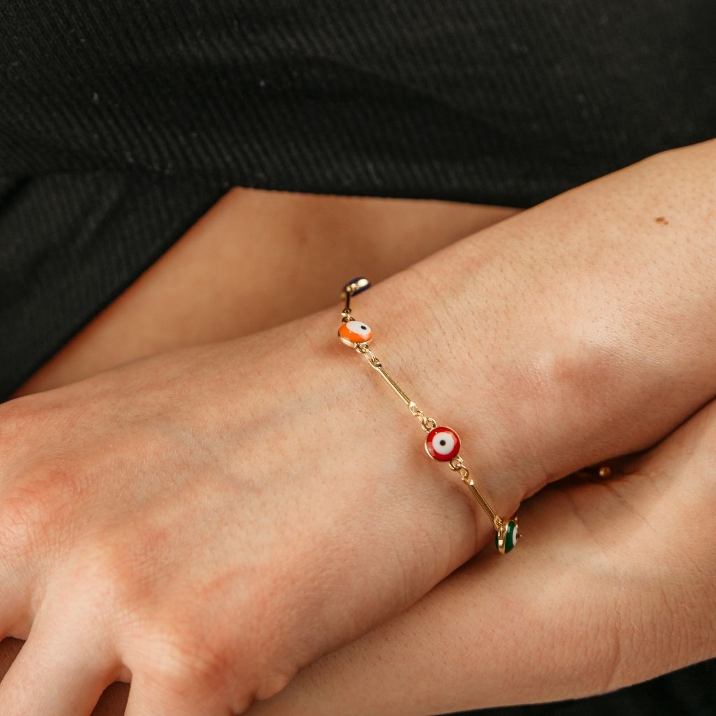 Fluttering Beauty: Embrace Your Animal Spirit with our Rose Gold Evil Eye Butterfly Dangle Charms Bracelet!