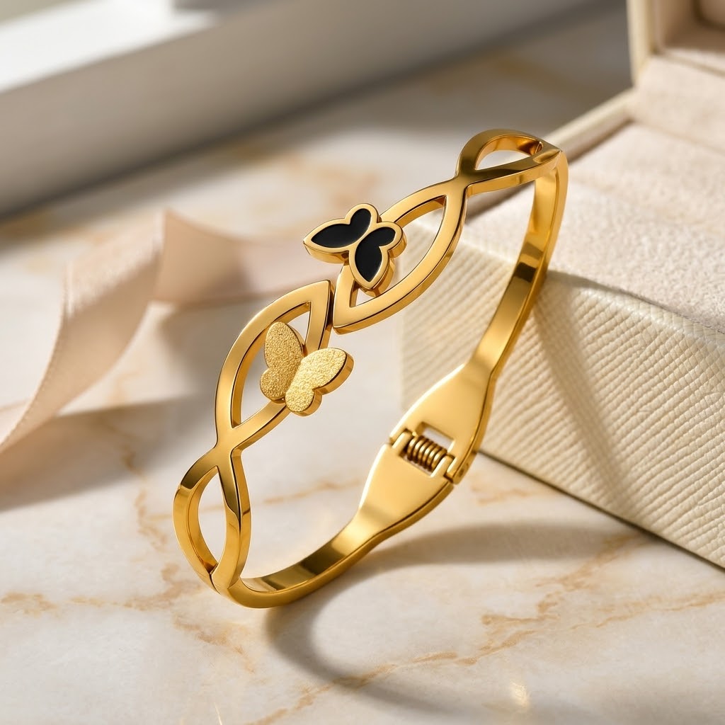 18ct Gold Plated Black Butterfly Infinity Cut Out Spring Hinged Bangle Bracelet (Close-up Detail) | The Colourful Aura