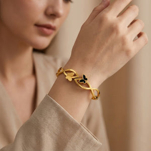 18ct Gold Plated Black Butterfly Infinity Cut Out Spring Hinged Bangle Bracelet (Close-up Detail) | The Colourful Aura