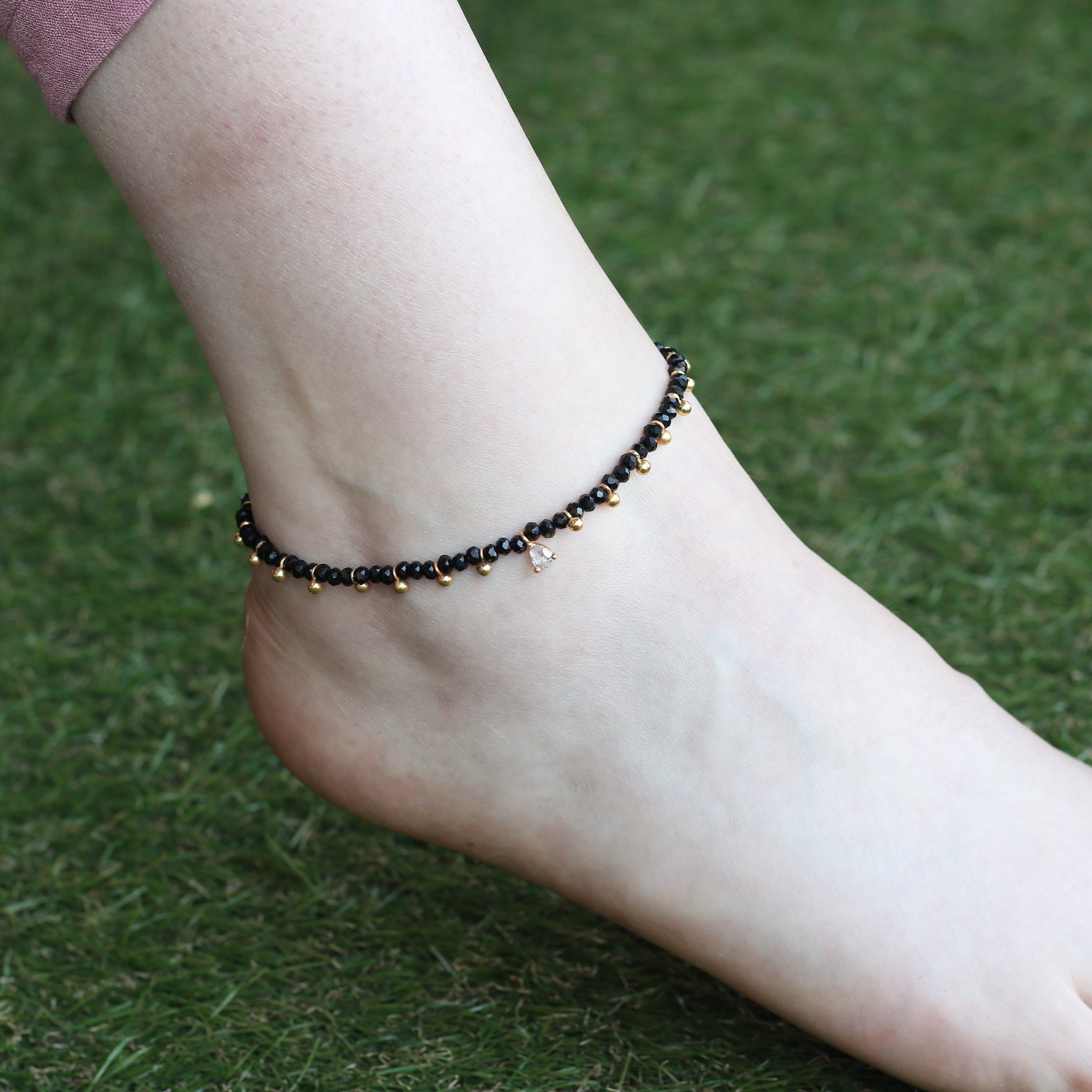 Black beaded gold dangle slim nazar payal anklet
