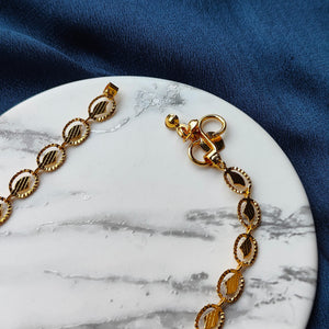 Golden Brass Oval Leaf Minimalist Boho Thin Slim Foot Payal Anklet (Close-up Detail) | The Colourful Aura
