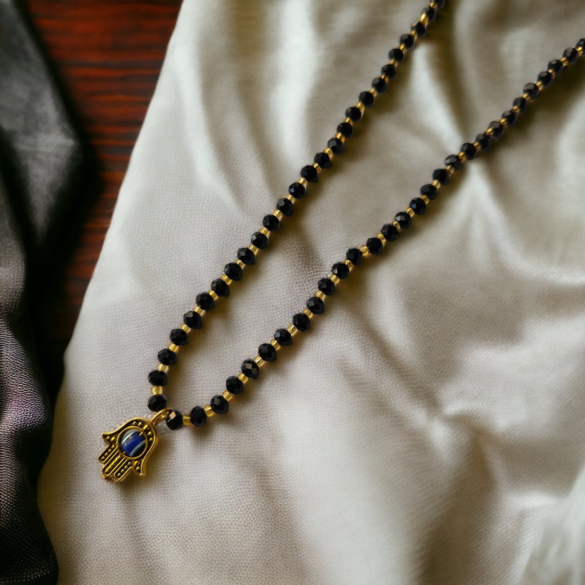 Black Crystal Gold Beaded Hamsa Mangalsutra Pendant Elegant Necklace