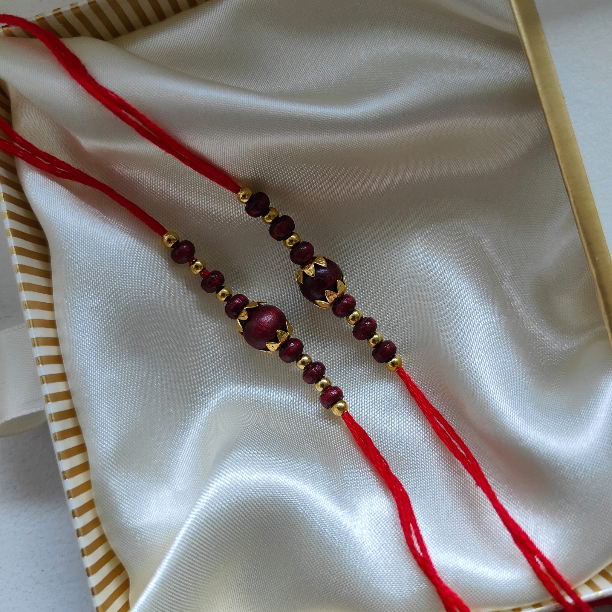 Golden Red Sandalwood Beaded Rakhi for Brother Raksha Bandhan