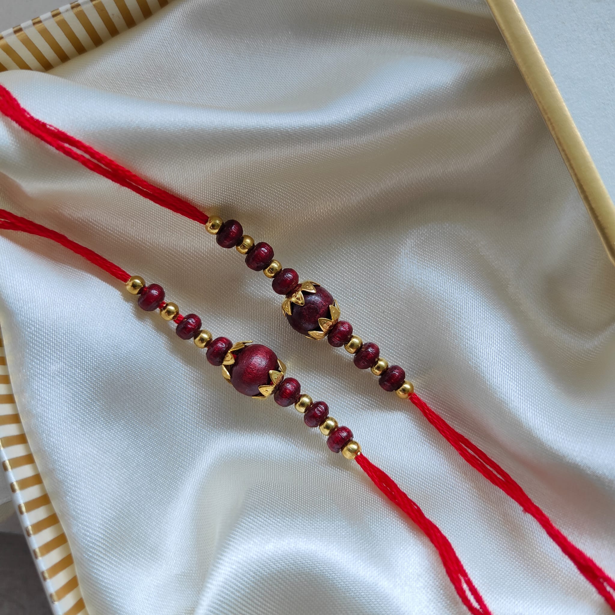 Golden Red Sandalwood Beaded Rakhi for Brother Raksha Bandhan