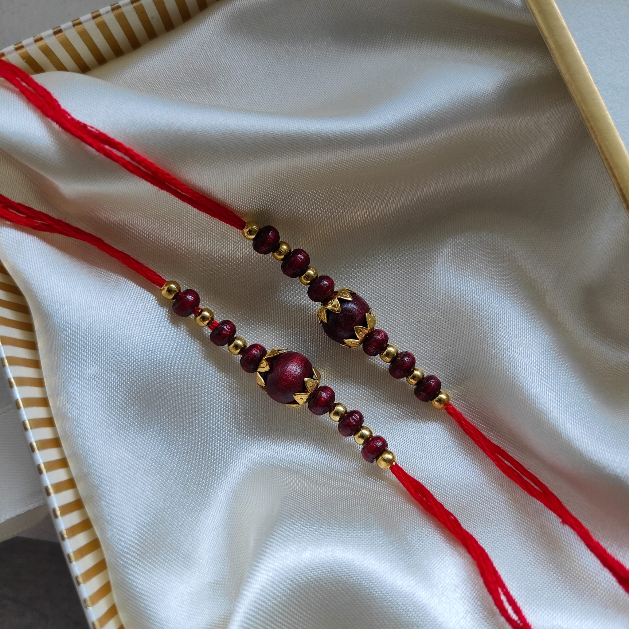 Golden Red Sandalwood Beaded Rakhi for Brother Raksha Bandhan