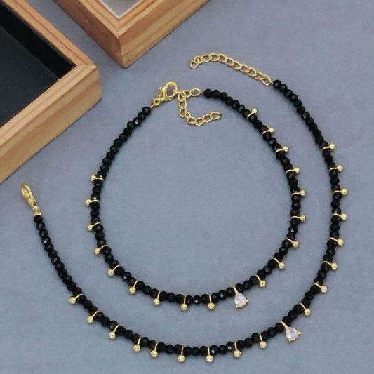 Black beaded gold dangle slim nazar payal anklet