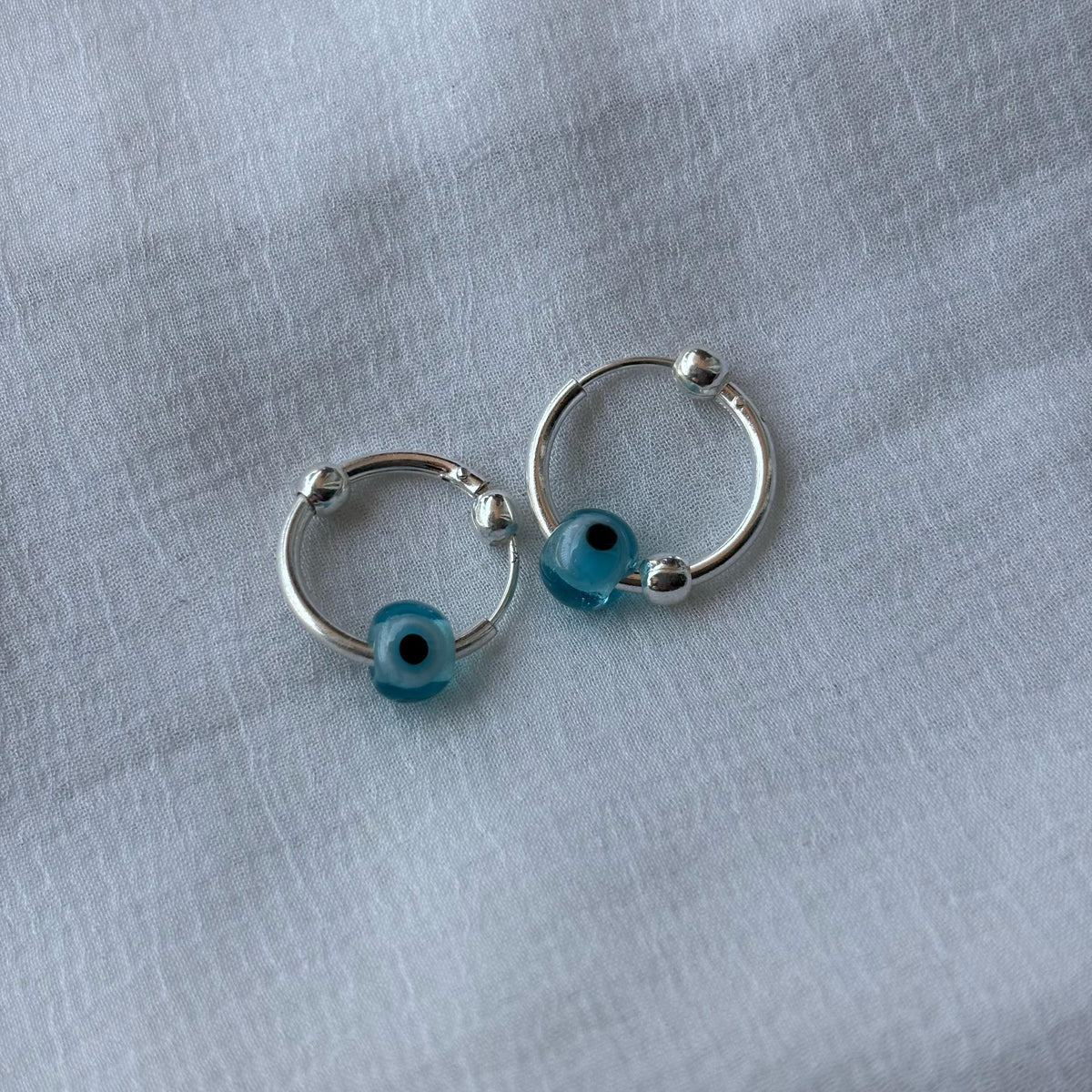 Evil Eye Silver Bali Asian Tiny Lightweight Hoop Earring — Boho Jewellery UK | The Colourful Aura