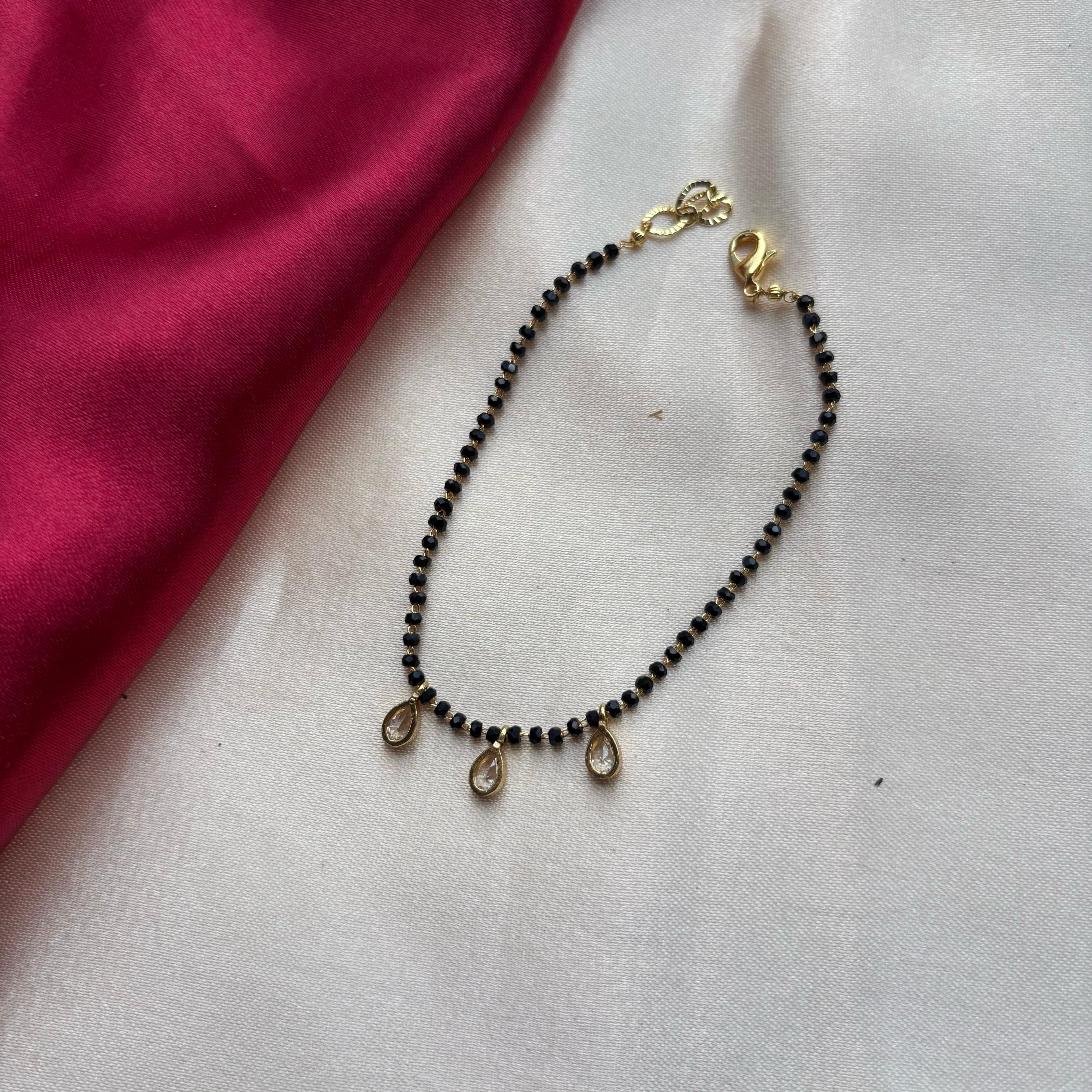 Elegant Black Beaded Nazar mangalsutra Dangle Zircon Bracelet