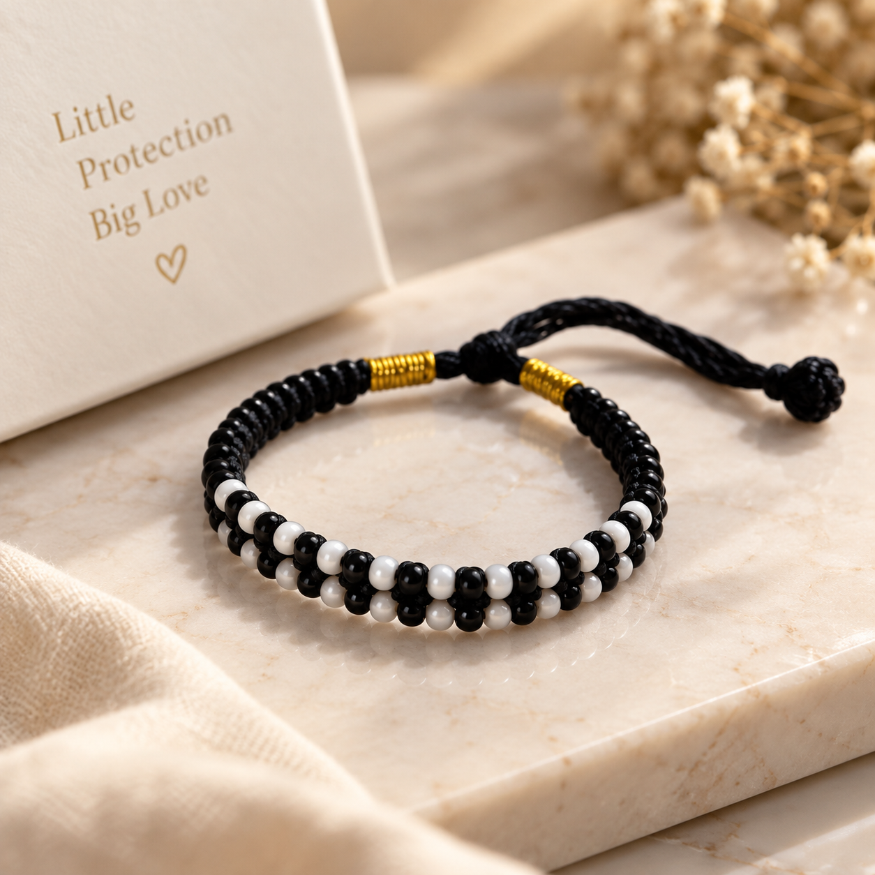 Adjustable Black and White Nazaria Bracelet for Kids — Boho Jewellery UK | The Colourful Aura