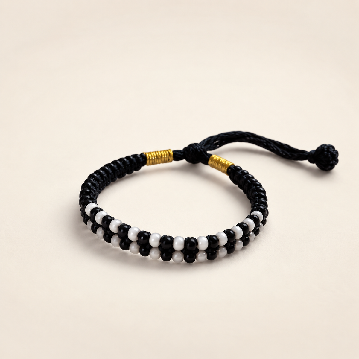 Adjustable Black and White Nazaria Bracelet for Kids (Close-up Detail) | The Colourful Aura