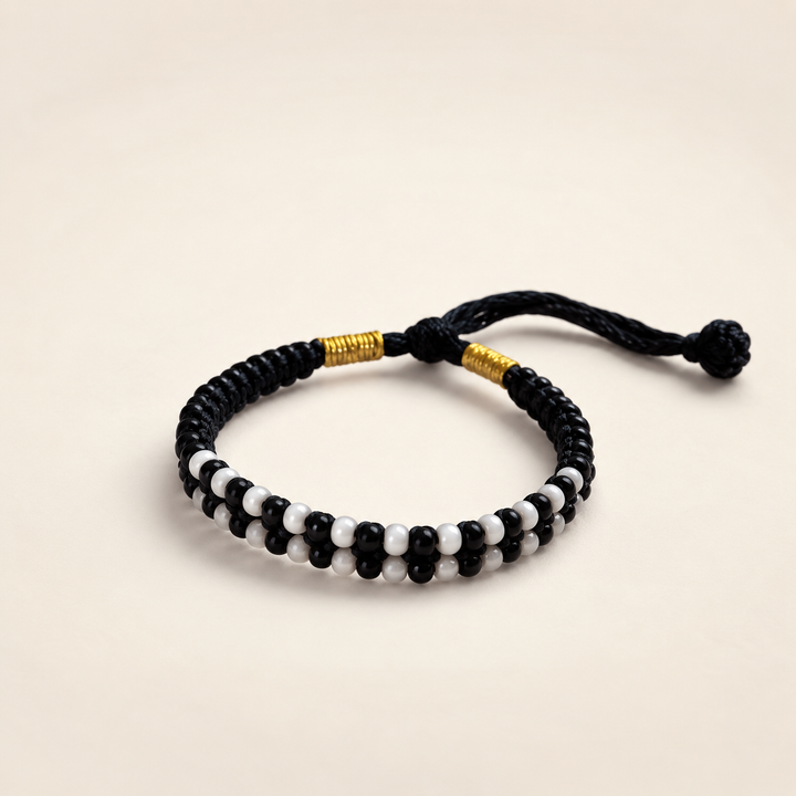 Adjustable Black and White Nazaria Bracelet for Kids (Close-up Detail) | The Colourful Aura