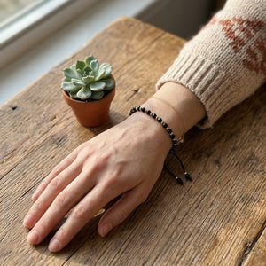Adjustable Gold Black Beads Bracelet For Newborns and Adults (Worn on Wrist with Succulent) | The Colourful Aura