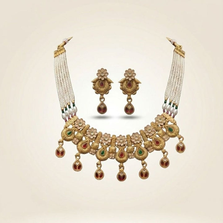 Antique gold kundan paisley choker necklace and floral drop earrings set — Asian bridal jewellery UK