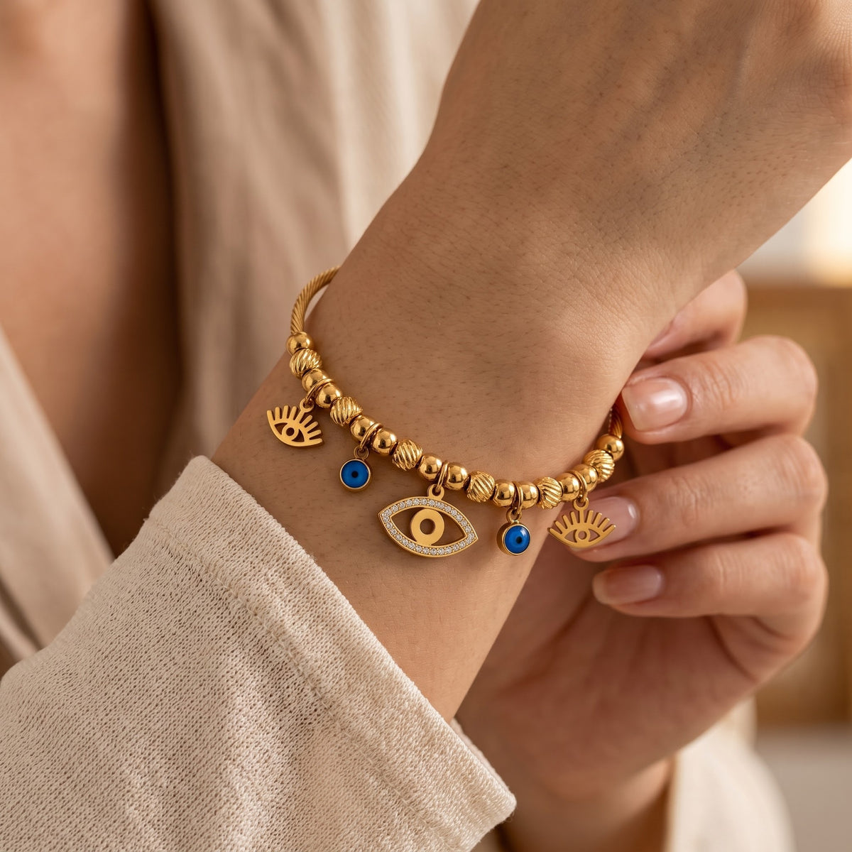Gold Evil Eye Dangle Charms Protection Dangly Bracelet (Close-up Detail) | The Colourful Aura