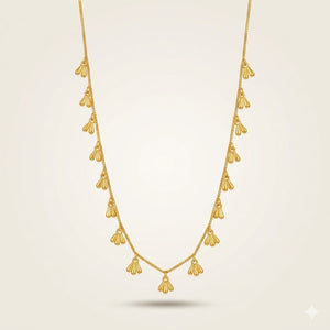 Gold fan charm drop necklace full length product shot — everyday jewellery UK
