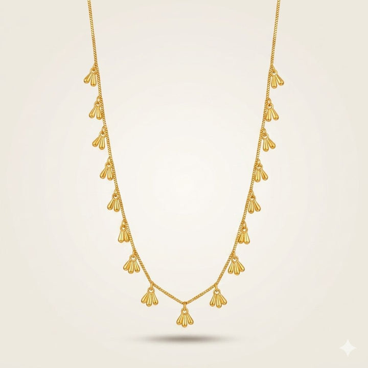 Gold fan charm drop necklace full length product shot — everyday jewellery UK
