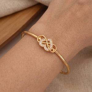 Gold Infinity Heart Bangle Bracelet (Close-up Detail) | The Colourful Aura