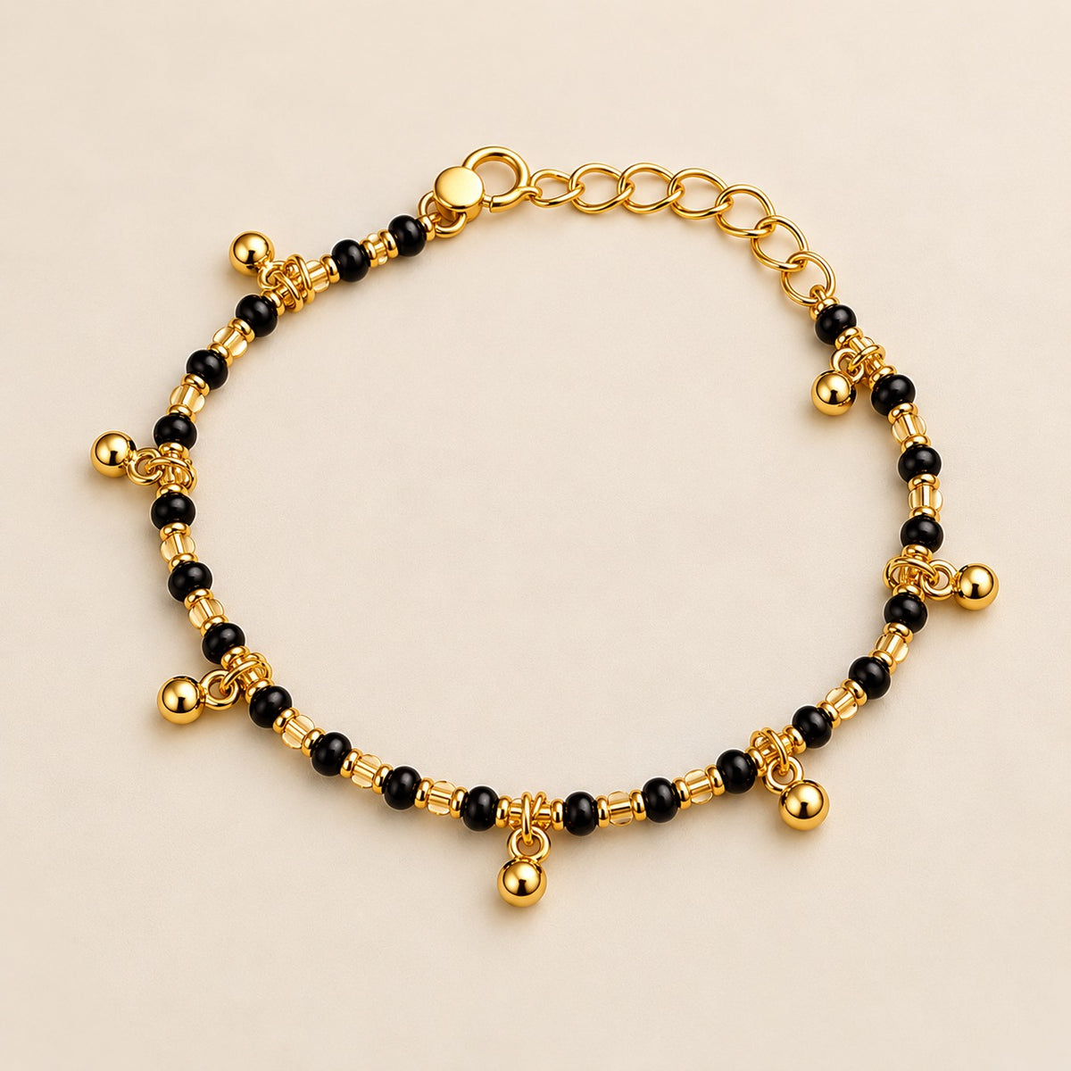 Gold Plated Black Bead Dangling Gold Ball Charm Kids Nazaria Bracelet — Boho Jewellery UK | The Colourful Aura