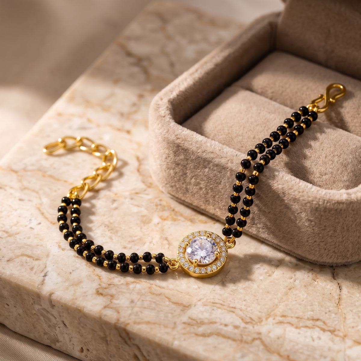 Gold Plated Black Bead Mangalsutra Bracelet with Round Charm (Close-up Detail) | The Colourful Aura