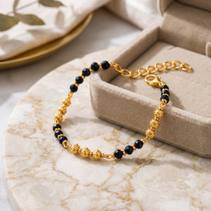 Gold Plated Black Crystal Bead Dotted Gold Ball Kids Nazaria Bracelet (Close-up Detail) | The Colourful Aura