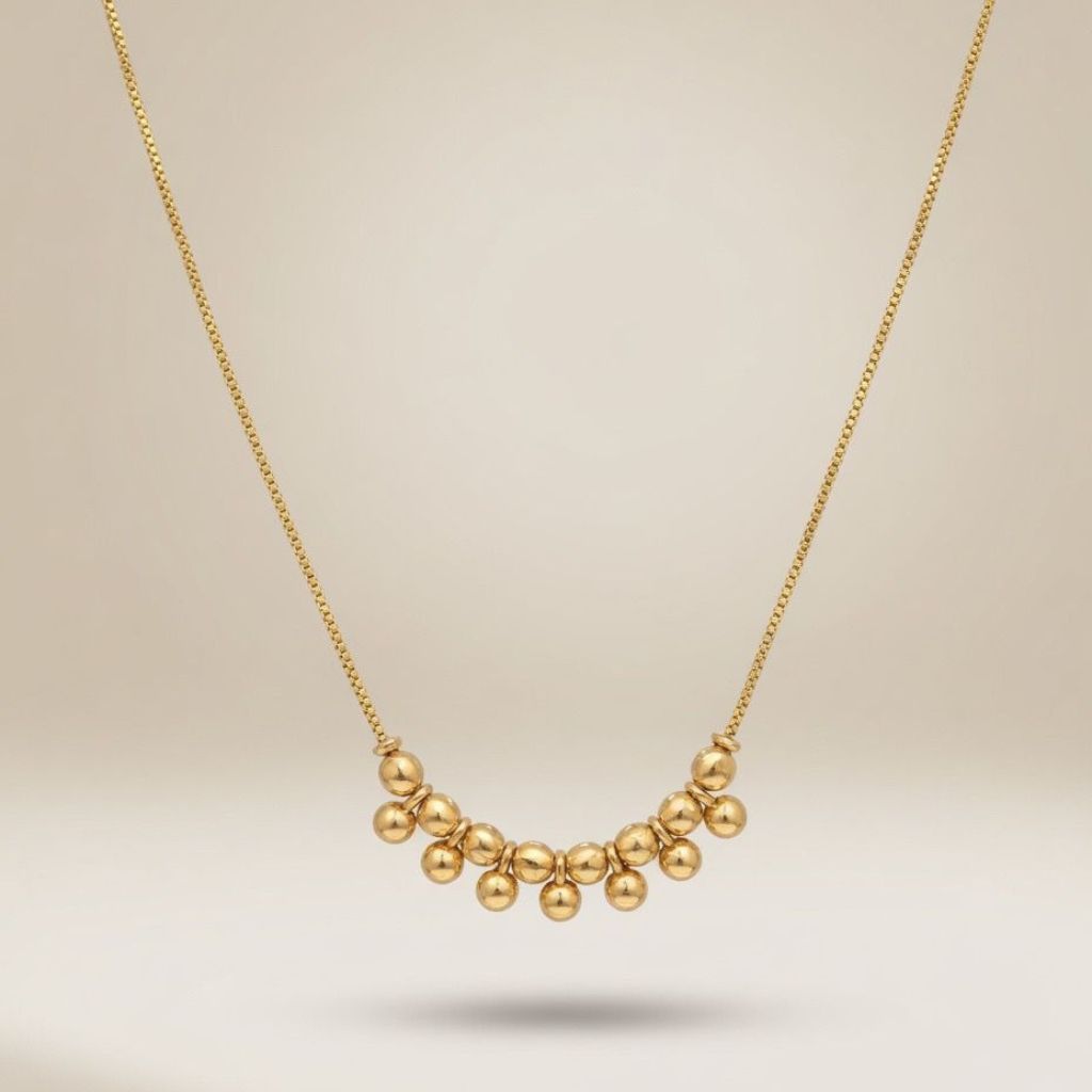 Gold plated cluster ball bead statement necklace flat lay product shot showing box chain