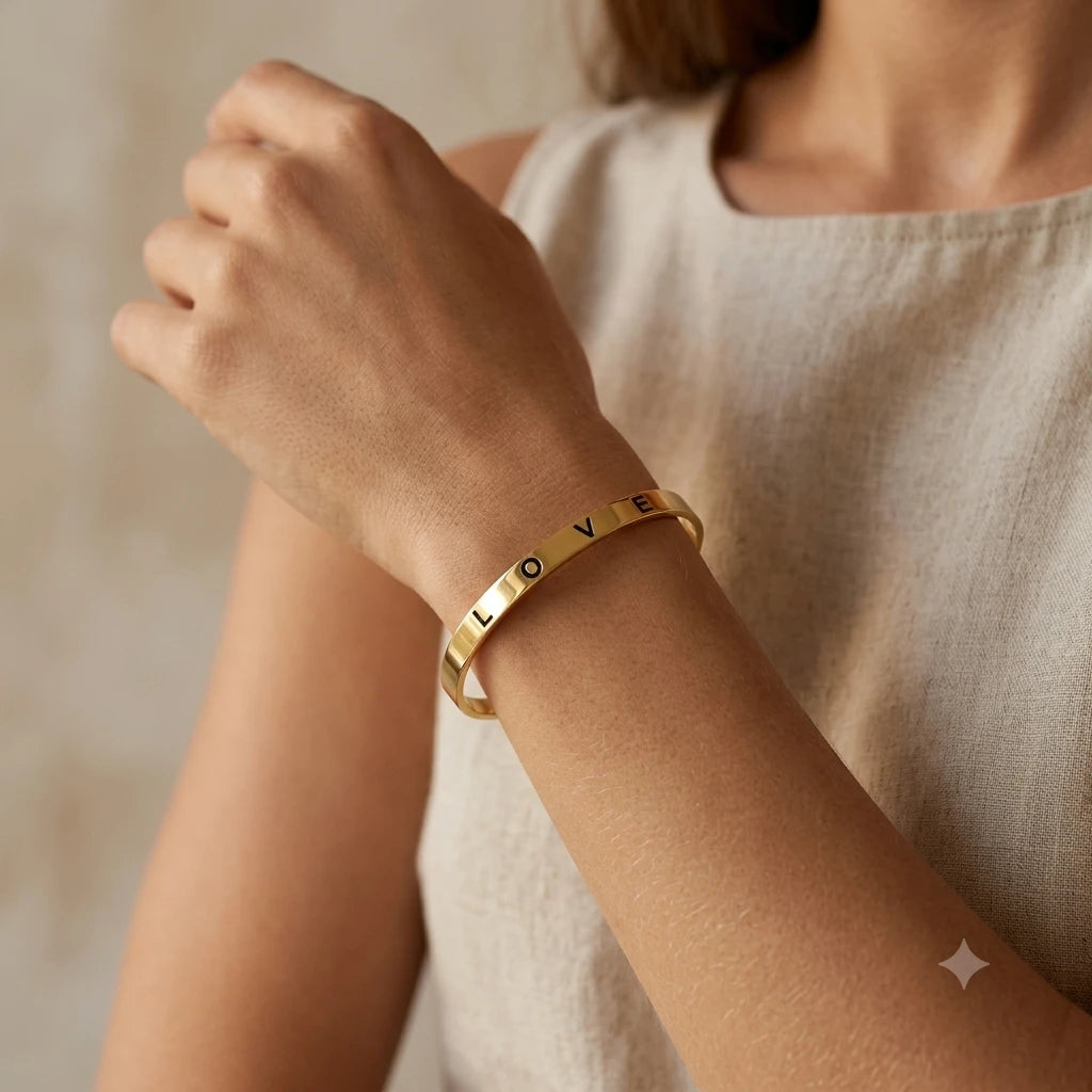 Gold Plated LOVE Engraved Open Cuff Bangle Bracelet (Close-up Detail) | The Colourful Aura