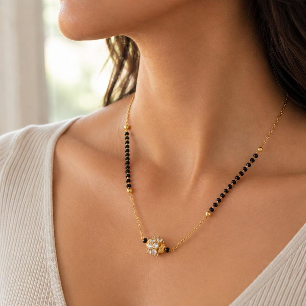 18 inch gold plated mangalsutra black bead necklace with CZ crystal centrepiece on model