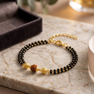 Gold Plated Rudraksha Mangalsutra Bracelet with Black Beads (Close-up Detail) | The Colourful Aura