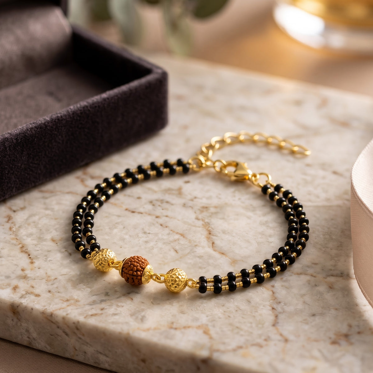 Gold Plated Rudraksha Mangalsutra Bracelet with Black Beads (Close-up Detail) | The Colourful Aura