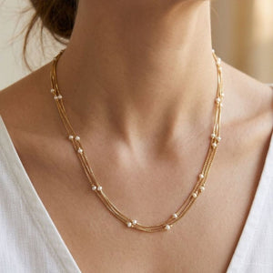 18 inch gold plated triple layer freshwater pearl station box chain necklace on model