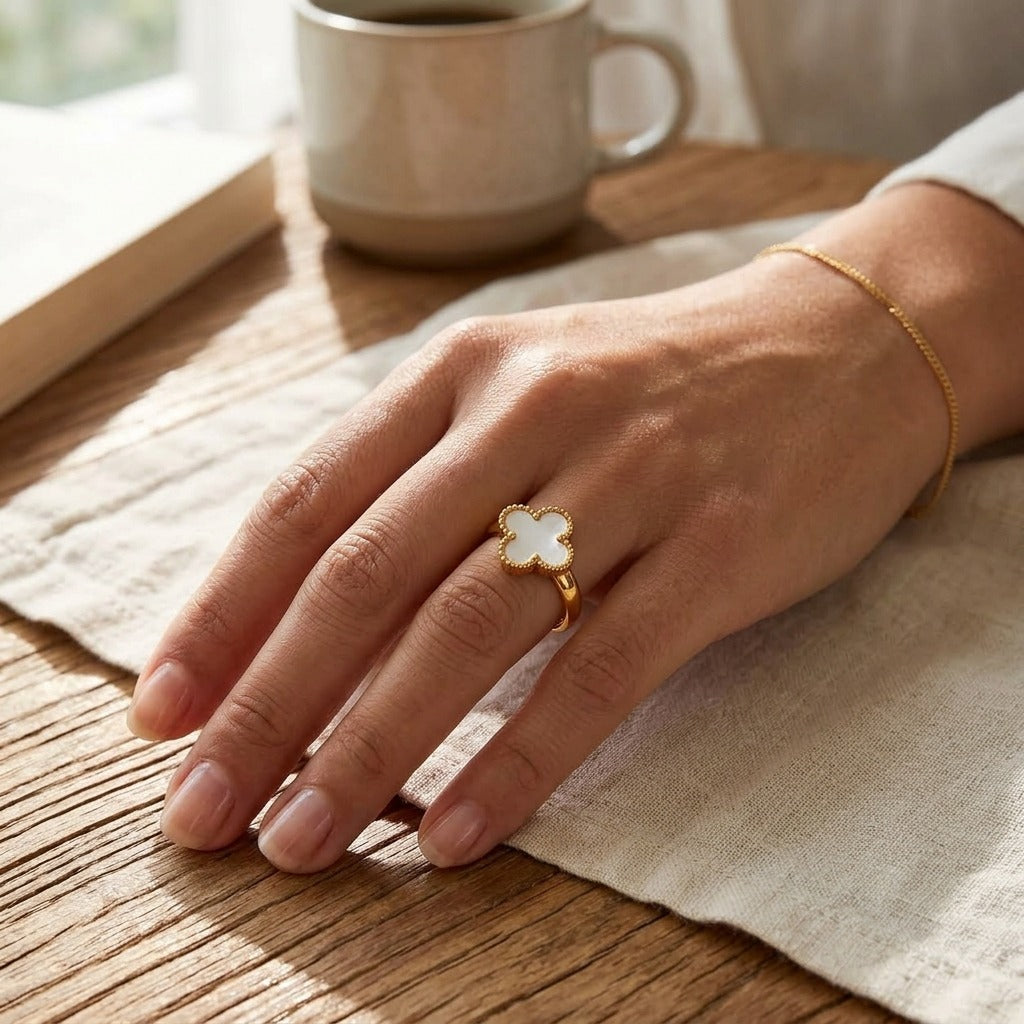 White Four Leaf Clover Adjustable Ring Worn on Hand (Close-up Detail) | The Colourful Aura