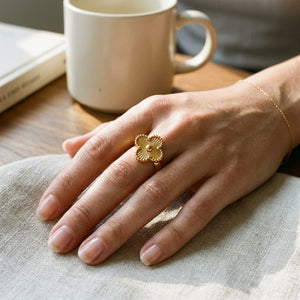 Gold Four Leaf Clover Adjustable Ring Worn on Hand (Close-up Detail) | The Colourful Aura
