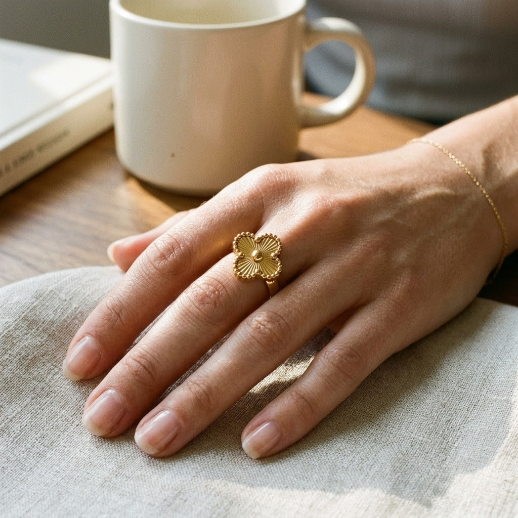 Gold Four Leaf Clover Adjustable Ring Worn on Hand (Close-up Detail) | The Colourful Aura