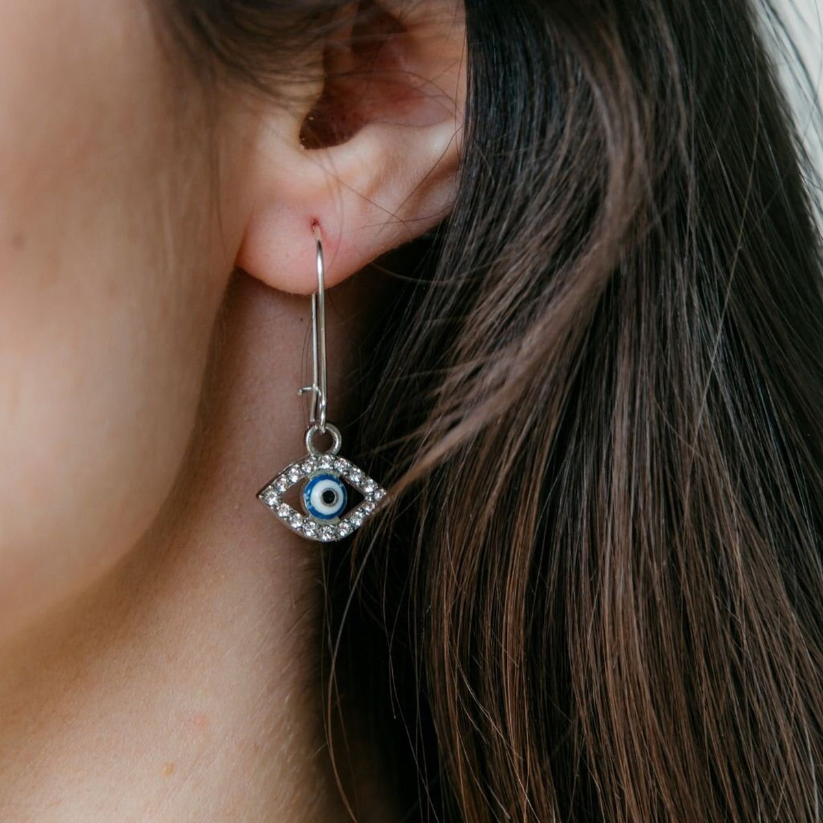 Long Silver Evil Eye Huggie Dainty Zircon Devil Eye Charm Latch Back Earrings — Boho Jewellery UK | The Colourful Aura
