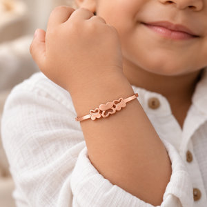Kids Rose Gold Triple Heart Charm Non-Tarnish Bangle Bracelet (Close-up Detail) | The Colourful Aura