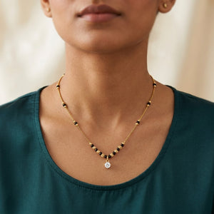 Modern Single Stone Gold Mangalsutra Necklace with Black Beads (Close-up Detail) | The Colourful Aura