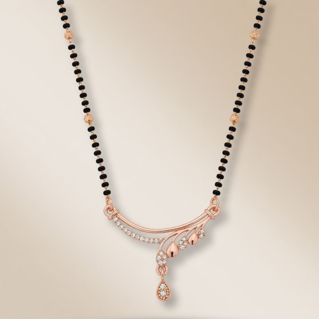 Rose gold plated mangalsutra with CZ crystal teardrop sweep pendant flat lay product shot