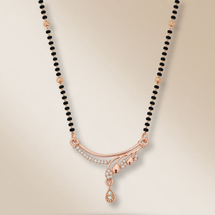 Rose gold plated mangalsutra with CZ crystal teardrop sweep pendant flat lay product shot