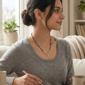 Model wearing rose gold double strand CZ marquise leaf mangalsutra lifestyle shot indoors