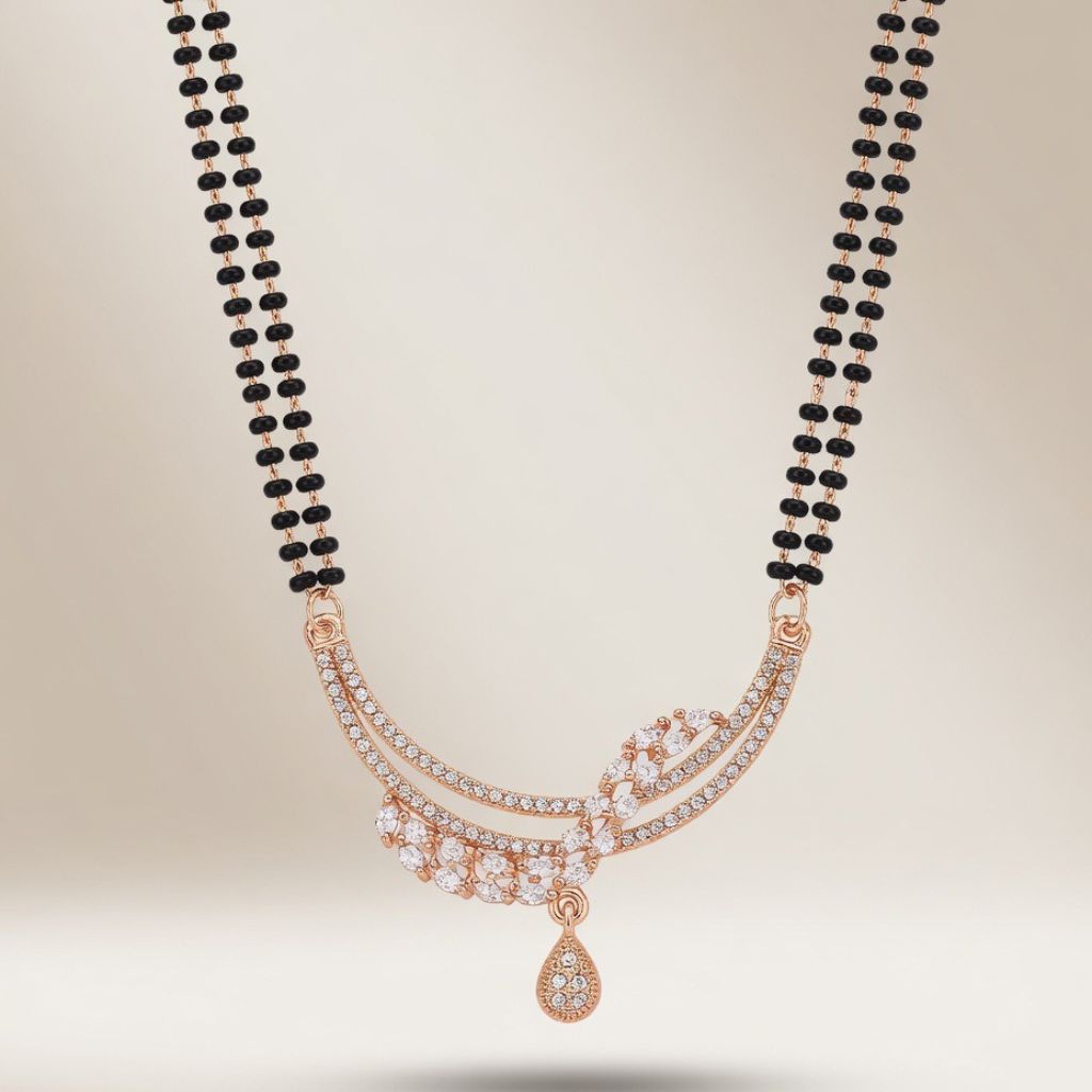 Rose gold plated double strand mangalsutra with CZ crystal marquise leaf pendant flat lay product shot