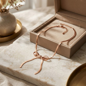 Rose Gold Plated Herringbone Chain Bow Necklace (Close-up Detail) | The Colourful Aura