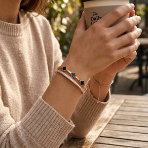 Rose Gold Plated Stainless Steel Black Clover Sparkle Hinged Bangle Bracelet (Close-up Detail) | The Colourful Aura