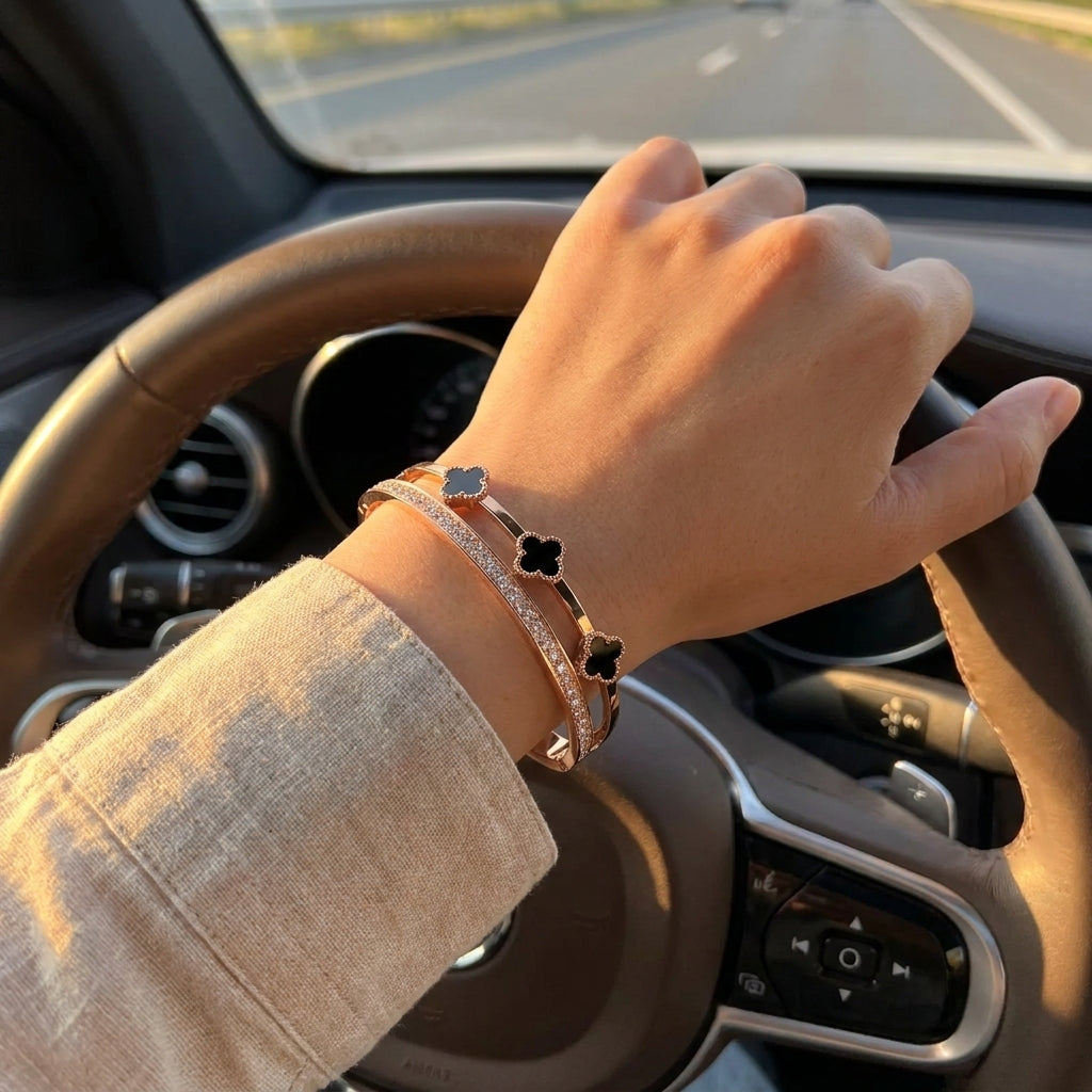 Rose Gold Plated Stainless Steel Black Clover Sparkle Hinged Bangle Bracelet (Close-up Detail) | The Colourful Aura