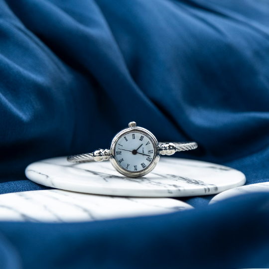 Silver Black Stainless Steel Roman White Dial Bangle Adjustable Bracelet Watch (Close-up Detail) | The Colourful Aura