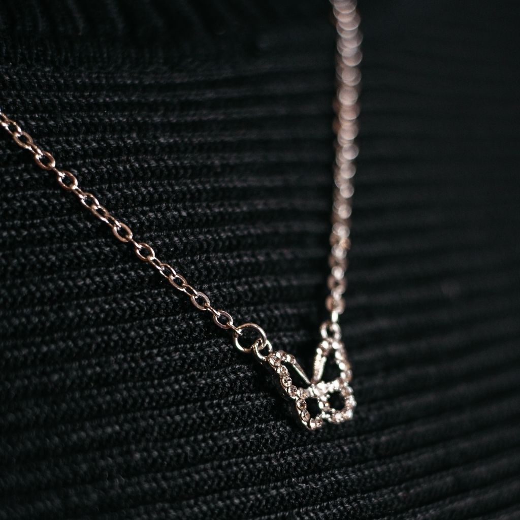 Silver and Gold Sparkly Dainty Butterfly Minimalistic Pendant Necklace (Close-up Detail) | The Colourful Aura
