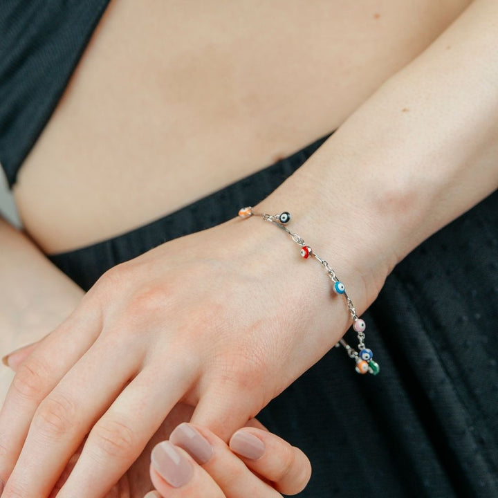 Silver Plated Dainty Evil Eye Protection Charm Beaded Dangly Adjustable Bracelet (Close-up Detail) | The Colourful Aura