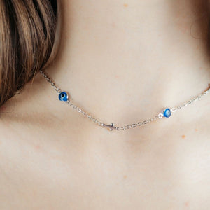 Blue Evil Eye Sideways Cross Necklace Minimalist Choker Dainty Protection Choker (Close-up Detail) | The Colourful Aura
