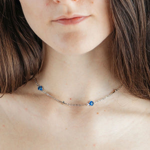 Silver Blue Evil Eye Sideways Cross Necklace Minimalist Choker Dainty Protection (Close-up Detail) | The Colourful Aura
