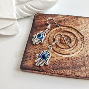 Silver Hamsa Protection Evil Eye Fatima Hand Charm Handmade Dangle Drop Earrings (Close-up Detail) | The Colourful Aura
